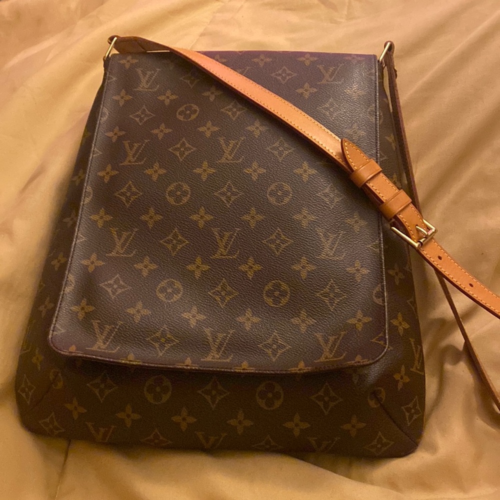 Authentic Louie Vuitton Cross body bag